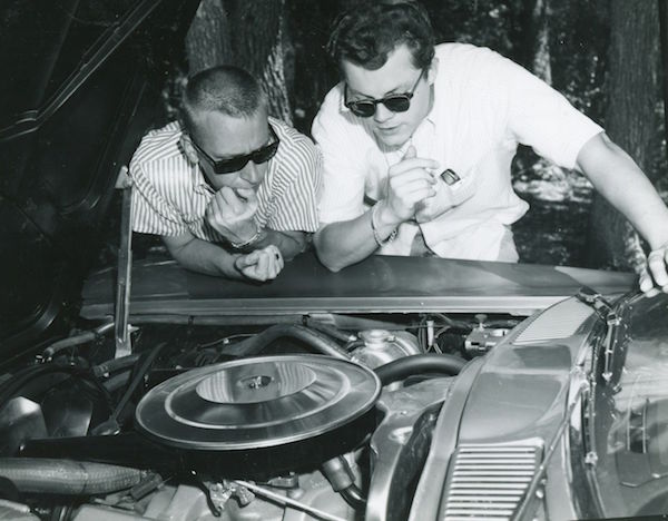 picture of Woody Roberts & Lee Baby Simms looking at a car engine